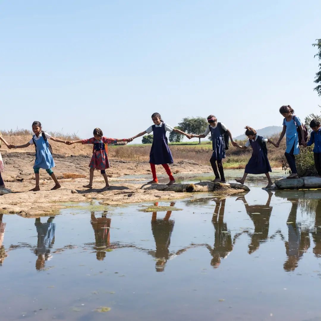 Children walking together in community